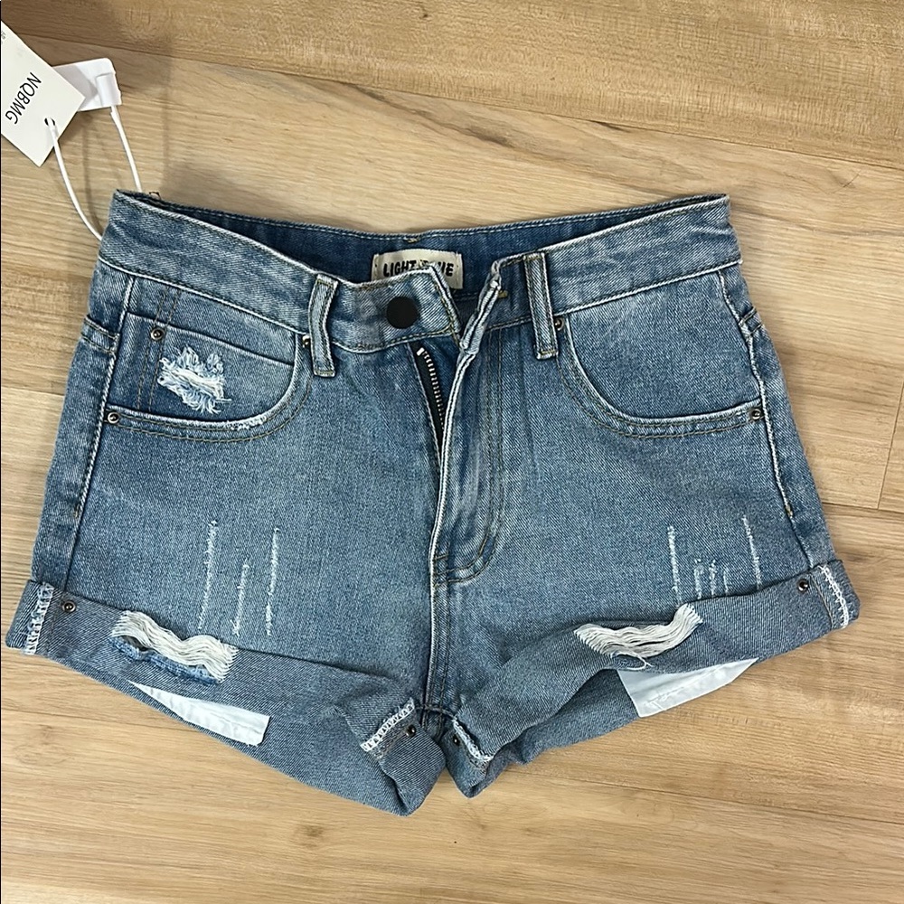 Blue Jean Shorts with Distressed Hem and Vintage Look